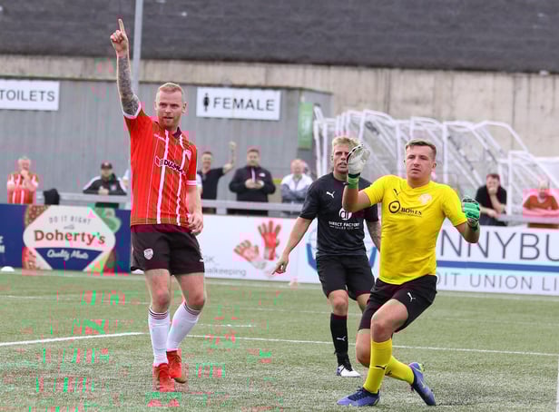 Derry City's Mark Connolly celebrates scoring against Oliver Bond Celtic.
