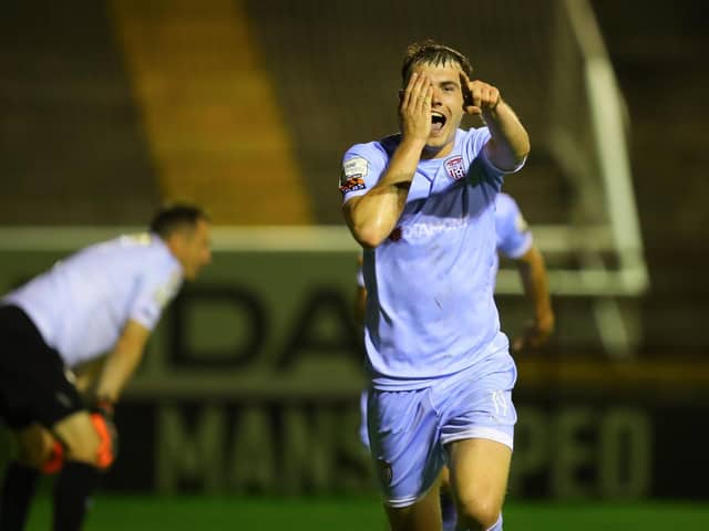 Derry City's Ryan Graydon runs away celebrating his late winner, at Shelbourne.