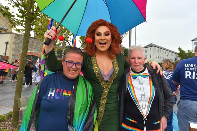 Porsche (centre) and friends at the Foyle Pride Parade in Derry on Saturday afternoon. Photograph: George Sweeney / Derry Journal. DER2234GS – 016