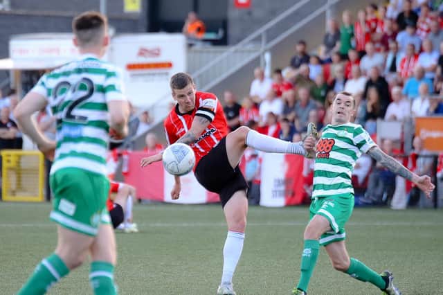 Derry City's Patrick McEleney gets his shot away before Shamrock Rovers midfielder Sean Kavanagh could challenge, during their recent game at the Brandywell.