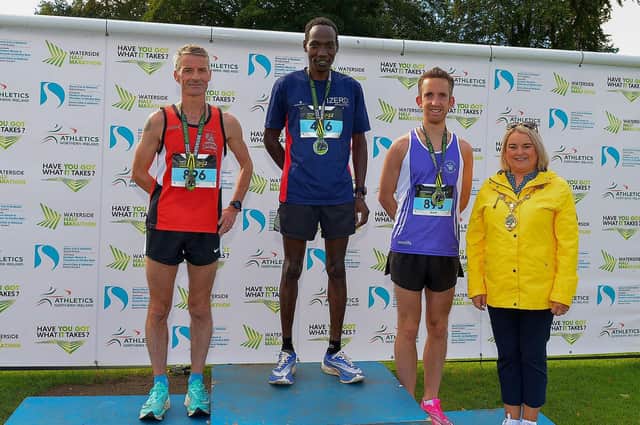 Mayor Sandra Duffy pictured with the 39th Waterside Half Marathon winners Declan Reed (2nd place) Gideon Kimosop winner and Scott Rankin (3rd place). Photo: George Sweeney. DER2236GS – 024