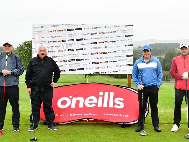 This fourball get ready to tee off at the Edgar McCormick Golf Classic, which took place at Foyle Golf Centre, on Saturday.