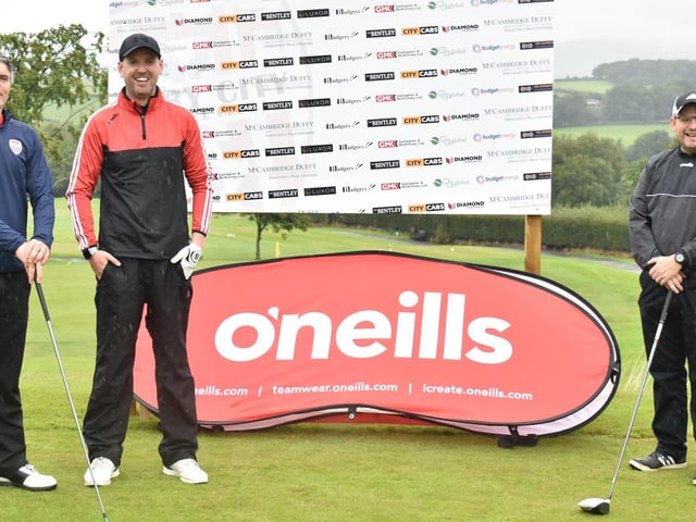 Declan Callaghan, John Murphy and Hugh McGrath get ready to tee off at the Edgar McCormick Golf Classic, which took place at Foyle Golf Centre, on Saturday.