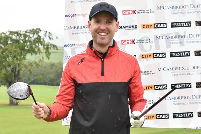 The unfortunate John Murphy sees the funny side after breaking his driver, during Saturday's Edgar McCormick Golf Classic, which took place at Foyle Golf Centre.