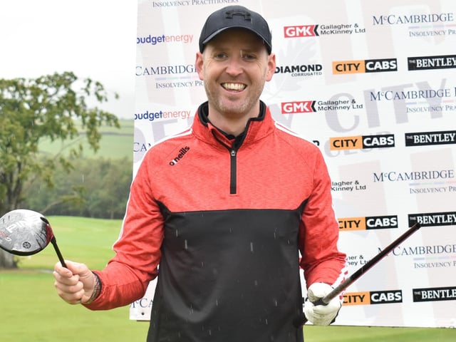 The unfortunate John Murphy sees the funny side after breaking his driver, during Saturday's Edgar McCormick Golf Classic, which took place at Foyle Golf Centre.