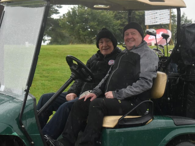Denis Bradley and Dessie McCallion are all smiles during Saturday's Edgar McCormick Golf Classic, which took place at Foyle Golf Centre.