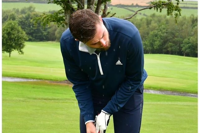 Will Patching lining up a putt during Saturday's Edgar McCormick Golf Classic, which took place at Foyle Golf Centre.
