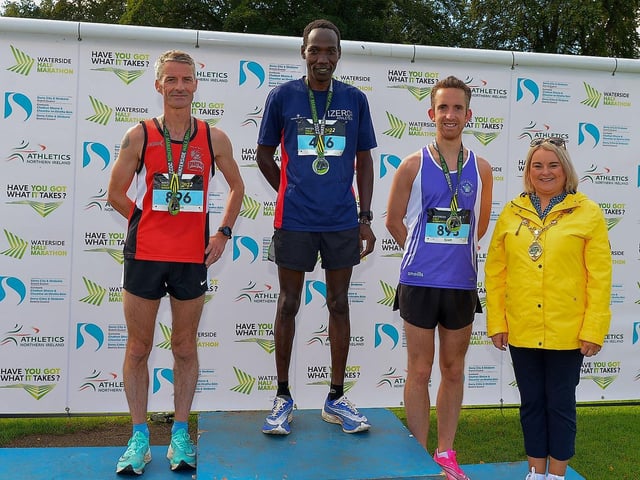 Mayor Sandra Duffy pictured with the 39th Waterside Half Marathon winners Declan Reed (2nd place) Gideon Kimosop winner and Scott Rankin (3rd place). Photo: George Sweeney. DER2236GS – 024
