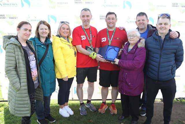 Mayor of Derry City and Strabane District Council, Councillor Sandra Duffy, and the Sheerin Family, present the inaugural Danny Sheerin Cup to Star Running Club runners Seamus Crossan and Stephen Quigley at Sunday’s Waterside Half Marathon.