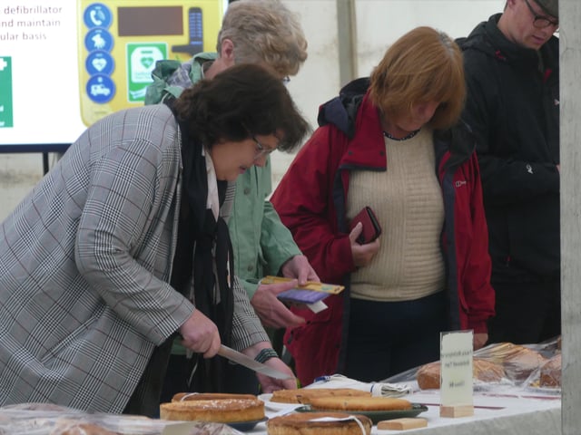 Paula McIntyre judging her own recipe for Bakewell Tart.