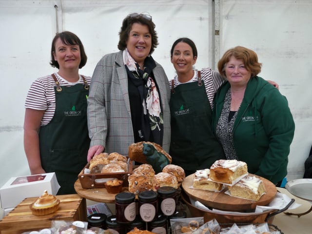 Paula McIntyre with Green Cat staff.