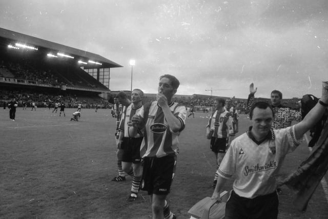Gary Beckett, who scored the opener, salutes the Derry City fans after the Candystripes beat Celtic 3-2 in July 1997.