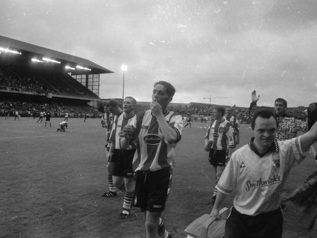 Gary Beckett, who scored the opener, salutes the Derry City fans after the Candystripes beat Celtic 3-2 in July 1997.