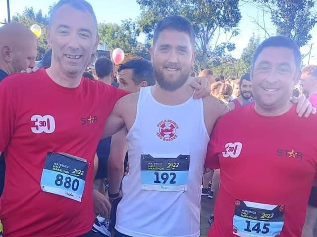 Ryan Dillon (centre) with Stephen Quigley and Seamus Crossan who are doing 30 half marathons in 30 days in September.