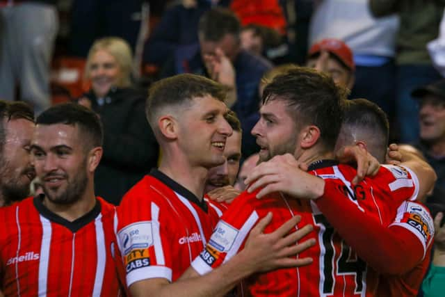 Derry City's Will Patching celebrates with his teammates after his winning goal against Sligo Rovers on Tuesday night.