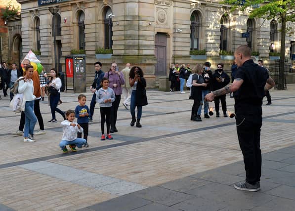 The Fire-eater performing in Waterloo Place, was a popular attraction, during the Culture Night last year. DER2137GS - 040
