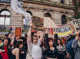 A group of LGBTQIA+ protesters blocking the counter-protest by the Christian group. Picture by Brendan Harkin
