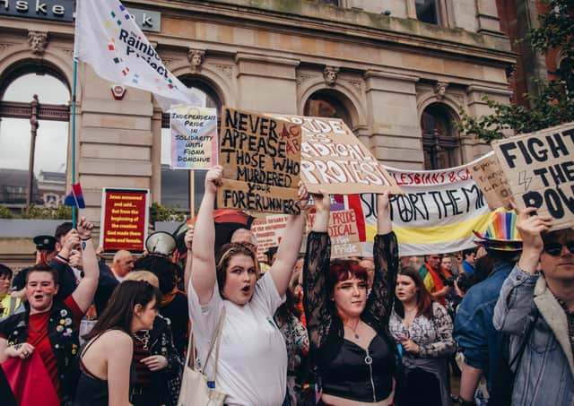 A group of LGBTQIA+ protesters blocking the counter-protest by the Christian group. Picture by Brendan Harkin