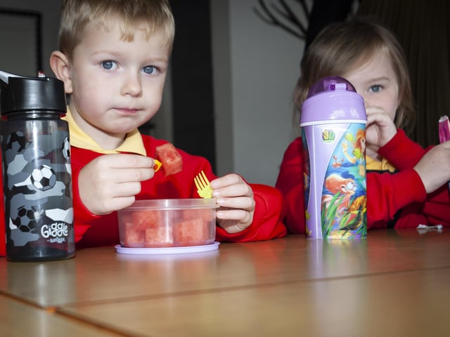 Young James Davison enjoying some fruit during breaktime in Miss Kelly's P1 class at Steelstown PS. (Photos: Jim McCafferty Photography)