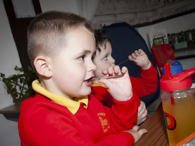 Snack time for Master Damien Barr, during breaktime in Miss Kelly's class.