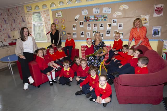 Mrs. Rochelle O'Donnell pictured with her Primary 1 class at Steelstown PS. Included on right is Mrs. Siobhan Gillen, Principal, and on left, Mrs. Joanne McLaughlin and Ms. Angela Cairns, Classroom Assistants. (Photos: Jim McCafferty Photography)