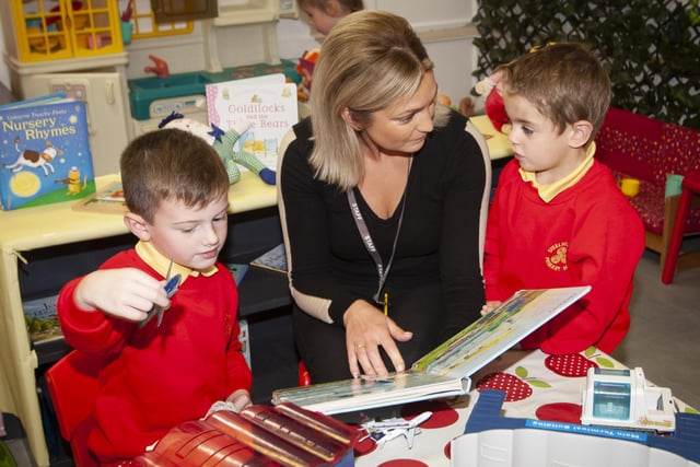 Mrs Joanne McLaughlin, Classroom Assistant pictured with P1s from Mrs. O'Donnell's class Caleb Cassidy and Sean Lynn-Fox. (Photos: Jim McCafferty Photography)