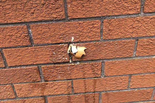 Egg shell left on the home of a woman in Hazelbank, where she lived with her mother and her daughter. The woman's house was attacked at around 5am on the morning of July 11 in a racist and homophobic targeted attack. The woman has since moved house and she has felt unable to return to her mother's home.