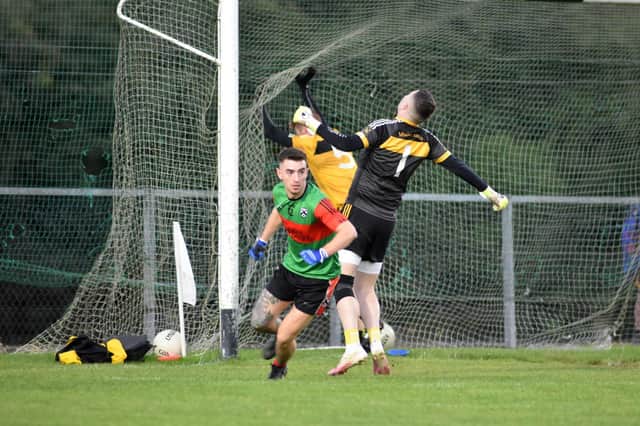 Doire Trasna's Caelan O'Connell wheels away in celebration after grabbing his side's second goal in Friday's Premier Electrics Derry Junior Championship quarter-final against Moneymore in Banagher.
