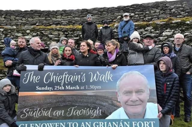 Mary Lou McDonald, with members of the McGuinness family and supporters at a previous launch of ‘The Chieftain’s Walk’, an annual charity walk in memory of Martin McGuinness, at Grianan of Aileach. DER0518GS027