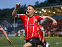 Derry City’s Brandon Kavanagh jumps for joy after his goal against Shamrock Rovers, on Sunday.