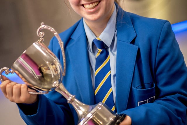 Eilise Anderson receiving her award for the Highest Achieving GCSE student.