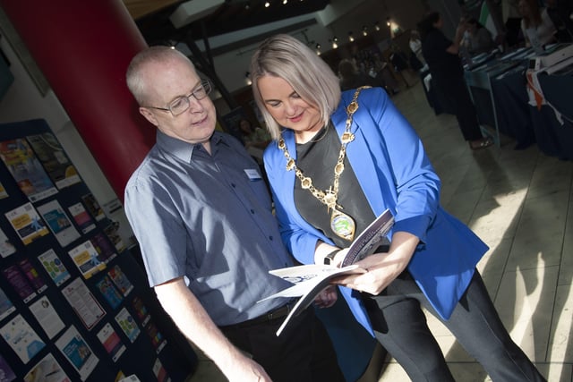 The Mayor, Sandra Duffy getting some information from Paschal Keys at the Derry Strabane Jobs Fair.
