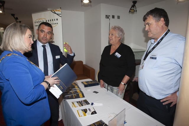 Mayor Sandra Duffy chatting to Joe Lavery, DFC and Barbara Gibson and Declan Martin, Cross Border Partnership Employment Services, exhibitors at the Derry Strabane Jobs Fair on Thursday at the Millennium Forum.
