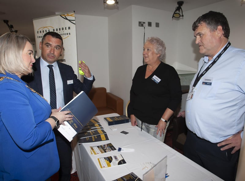 Mayor Sandra Duffy chatting to Joe Lavery, DFC and Barbara Gibson and Declan Martin, Cross Border Partnership Employment Services, exhibitors at the Derry Strabane Jobs Fair on Thursday at the Millennium Forum.