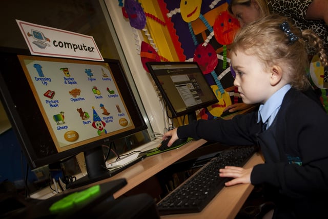 A dab hand on the computer is Connie Young, a P1 pupil in Mrs. Harkin's class.