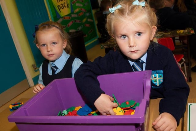 Primary 1s in Mrs. Deborah White’s class, Ava Good and Niamh Harkin hard at play.