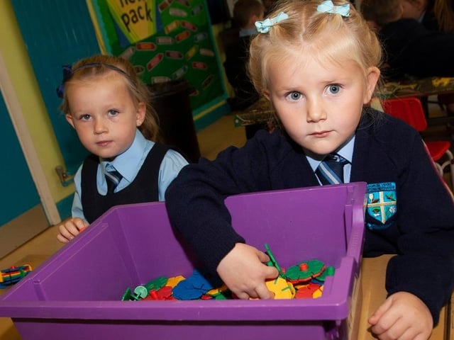 Primary 1s in Mrs. Deborah White’s class, Ava Good and Niamh Harkin hard at play.