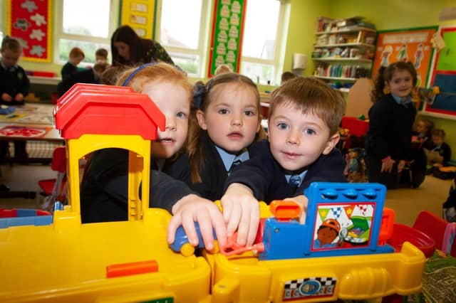 Hollybush PS Primary 1s Ailbhe Harley-Moore, Mary-Kate Doherty and Aodhan Rainey hard at play. (Photos: Jim McCafferty Photography)