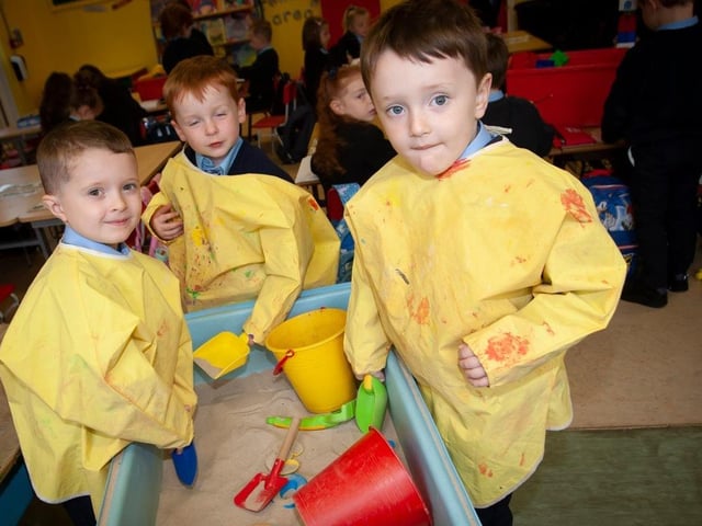Sand in hand for P1 pupils Oliver Logue, Charlie Kelly and Malachy McLean.