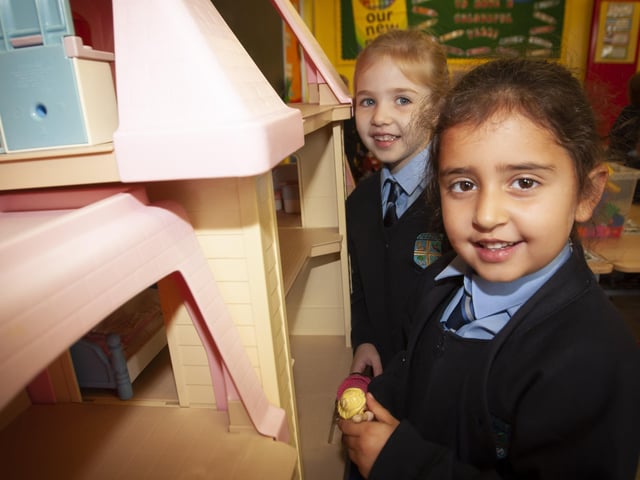 Cara and Aoife playing with the doll's house in Mrs. Harkin's P1 class this week.