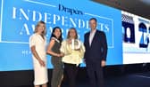 The team from the Re:Imagine Pop Initiative receiving the Drapers Independent Community Champion Award for 2022 at Grosvenor House, London. From left are Leeann Doherty, Business Officer at Derry City and Strabane District Council, Catriona Hutton, Proprietor Koto Candles, Deirdre Williams, Fashion Textile and Design Centre and Fergal Rafferty, Manager Foyleside Shopping Centre.