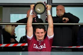 Slaughtneil captain Cormac O’Doherty lifts the Derry Senior Hurling Championship trophy after their victory over Kevin Lynch’s  in Owenbeg on Sunday. Photo: George Sweeney.  DER2239GS – 024