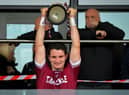 Slaughtneil captain Cormac O’Doherty lifts the Derry Senior Hurling Championship trophy after their victory over Kevin Lynch’s  in Owenbeg on Sunday. Photo: George Sweeney.  DER2239GS – 024