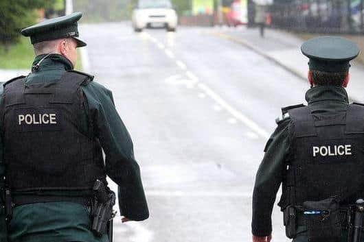 Police say two men were assaulted outside a pub in Derry this morning.