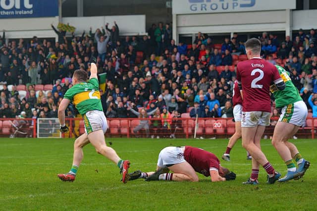 Glen's Cathal Mulholland wheels away in celebration after his goal clinched the Derry Senior football championship final against Slaughtneil in Celtic Park on Sunday. (Photo: George Sweeney)