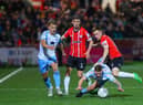 Brandon Kavanagh is thwarted by a resolute Shelbourne defence on Friday night. Photo by Kevin Moore.