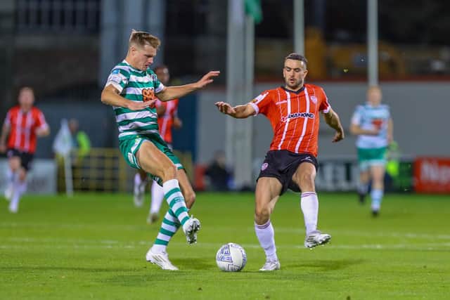 Michael Duffy closes down the ball in the first half of Sunday's league clash with Shamrock Rovers. Photographs by Kevin Moore.