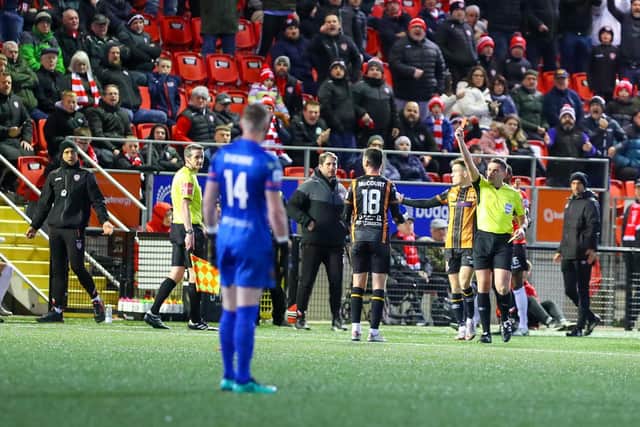 Robbie McCourt sees red and follows Derry City midfielder Sadou Diallo off the pitch in the first half after the two players got involved in an altercation in the middle of the pitch. Photograph by Kevin Moore