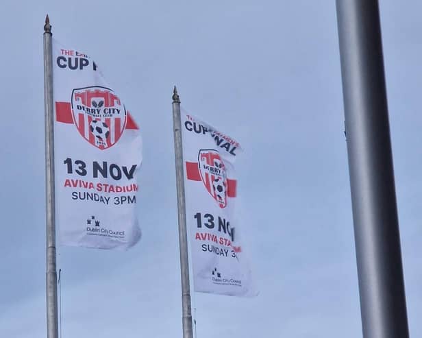 The Derry City crest flying high over the Liffey.