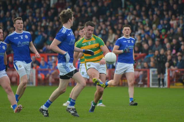 Neil McNicholl scores a first half point for Glenullin against Galbally Pearses. (Photo: George Sweeney)